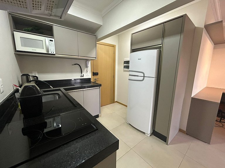 Apto Moderno com garagem passos da Vila Germânica