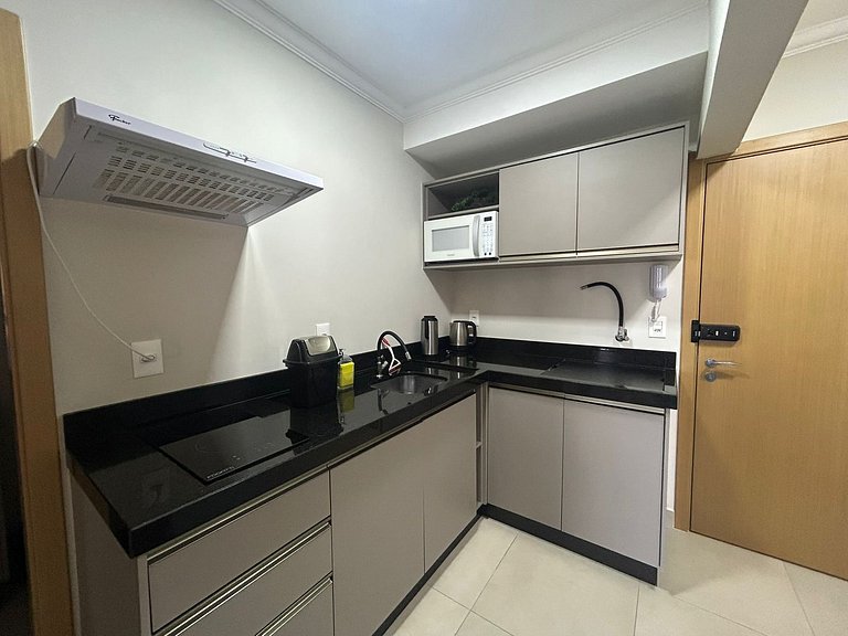 Apto Moderno com garagem passos da Vila Germânica