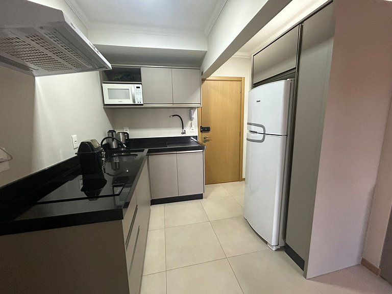 Apto Moderno com garagem passos da Vila Germânica