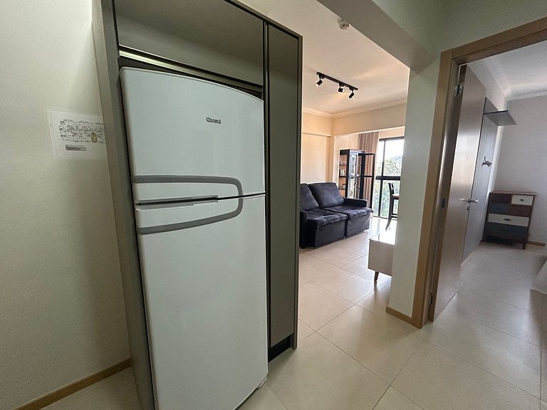 Apto Moderno com garagem passos da Vila Germânica