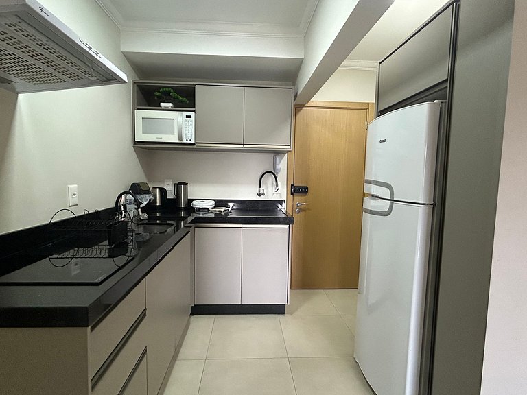 Apto Moderno com garagem passos da Vila Germânica