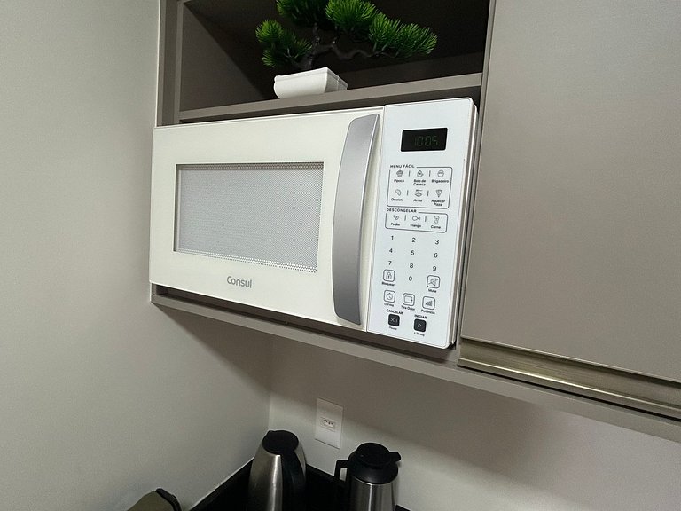 Apto Moderno com garagem passos da Vila Germânica